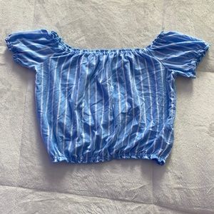 blue striped ruffle top.